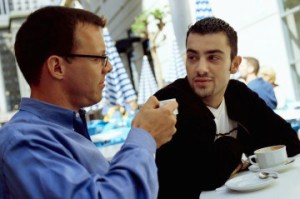 Two Men Enjoying Coffee ca. 2000 San Francisco, California, USA