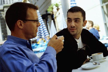 Two Men Enjoying Coffee