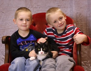 two-boys-with-their-cat